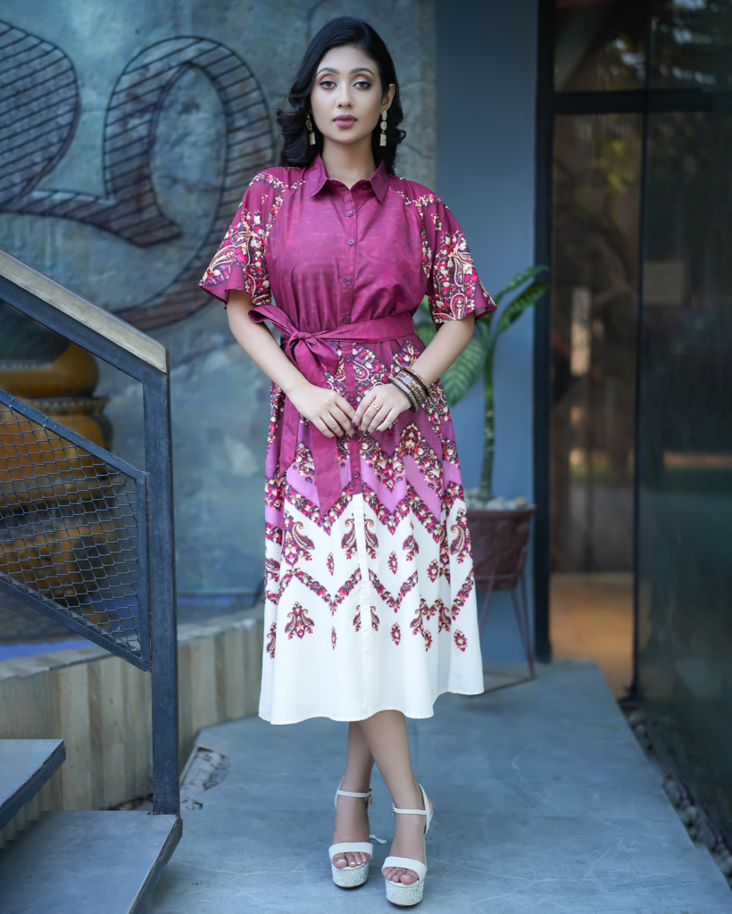 Model wearing ARIZA Magenta Printed Belted Long Tunic with ornamental patterns, a shirt collar and contrasting white lower panel.